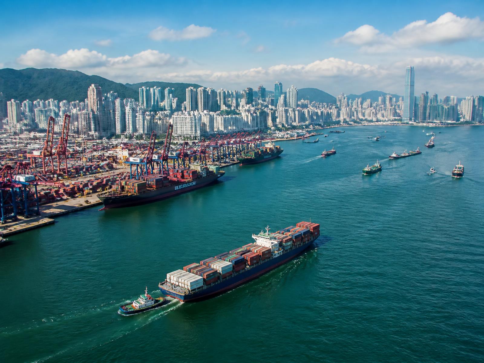 Aerial view of Hong Kong harbour with container terminal and cargo vessels